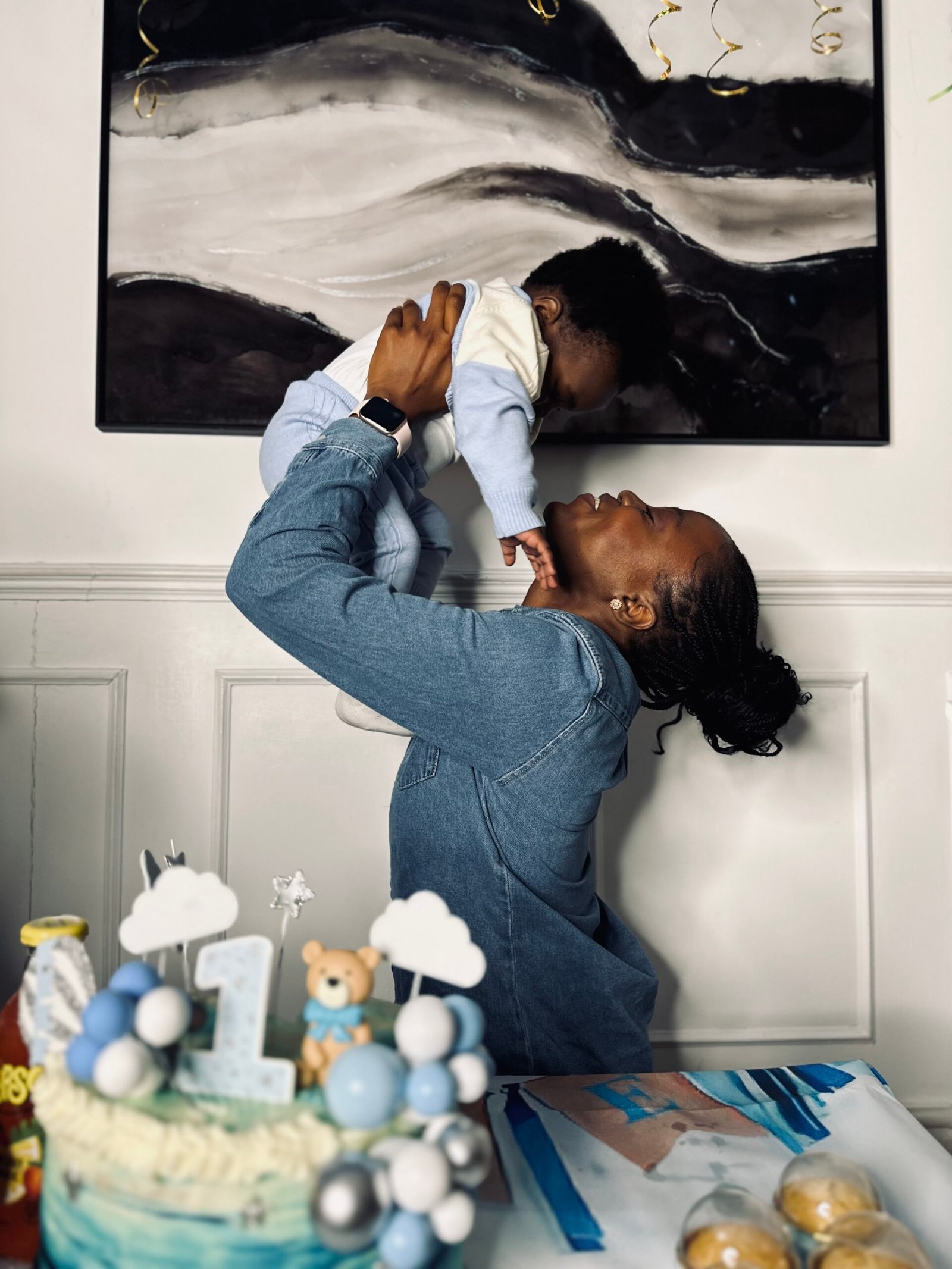 Desola Banjo with a child